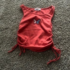 MIGHTY FINE reddish orange crop